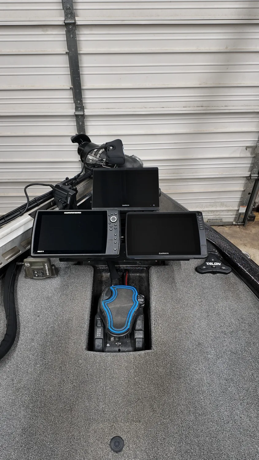Finished multi-display sonar electronics installation at the bow of a Phoenix bass boat
