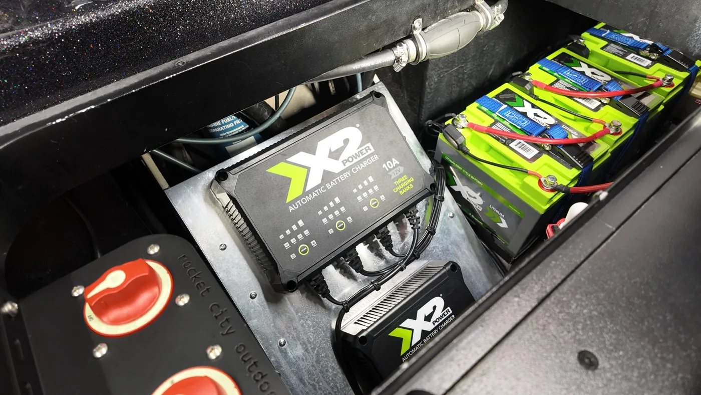 Finished lithium battery and power installation in a Skeeter bass boat battery compartment